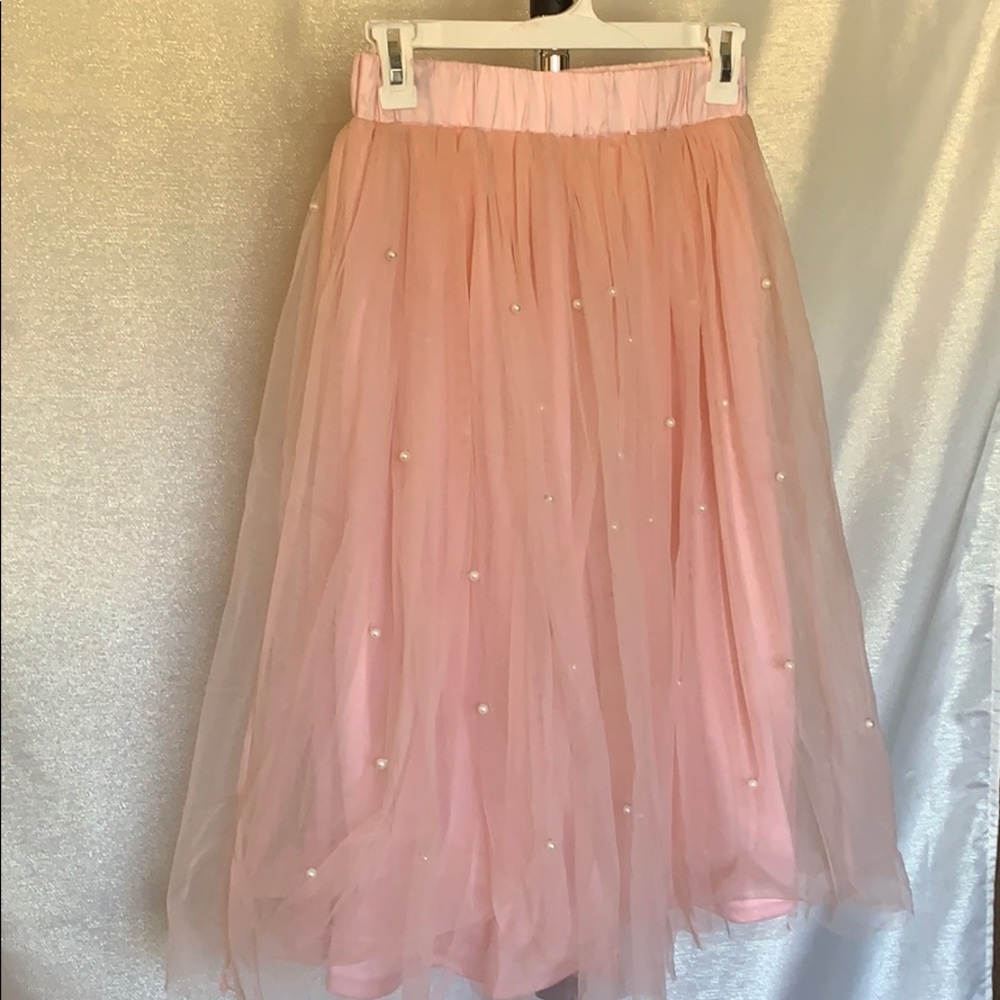 Pink shirt with pearl details